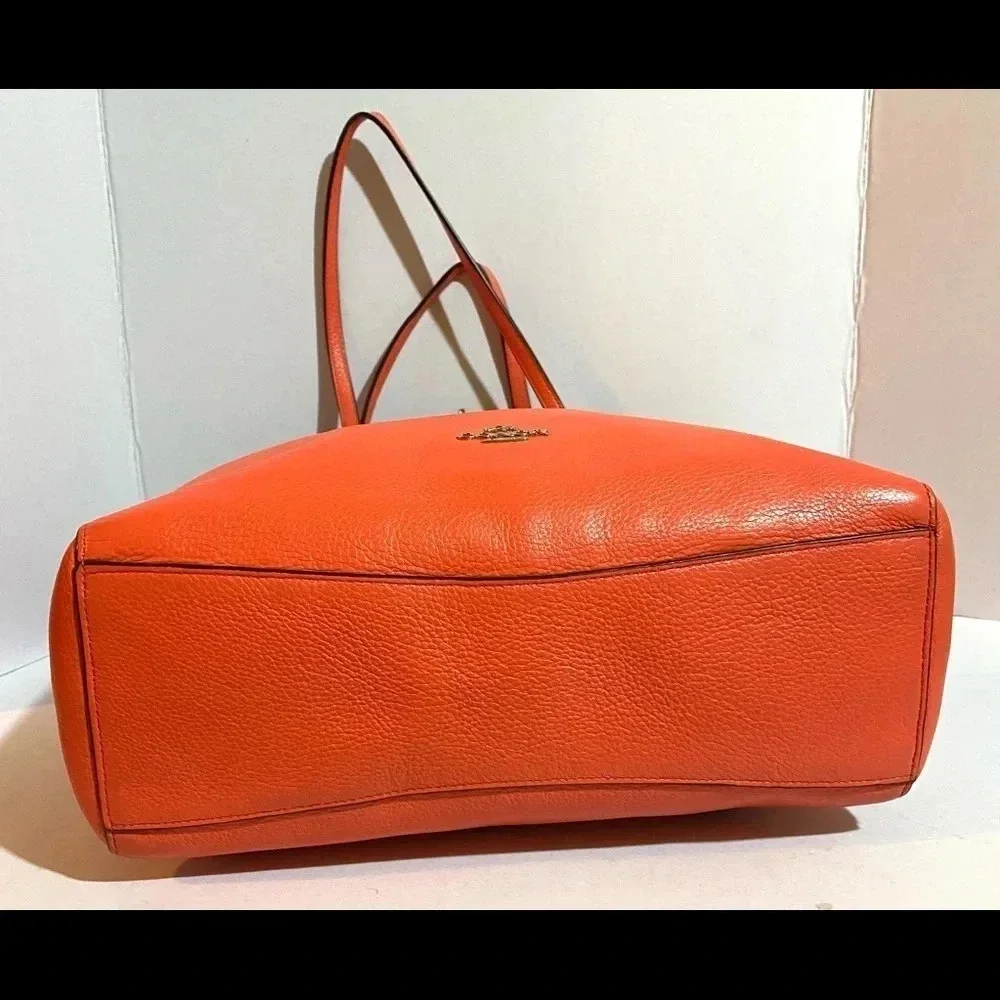 Coach coral leather